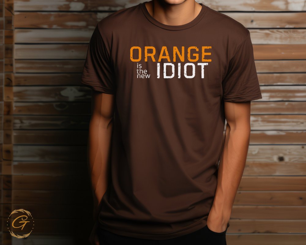 Orange is the New Idiot Text Brown Shirt product