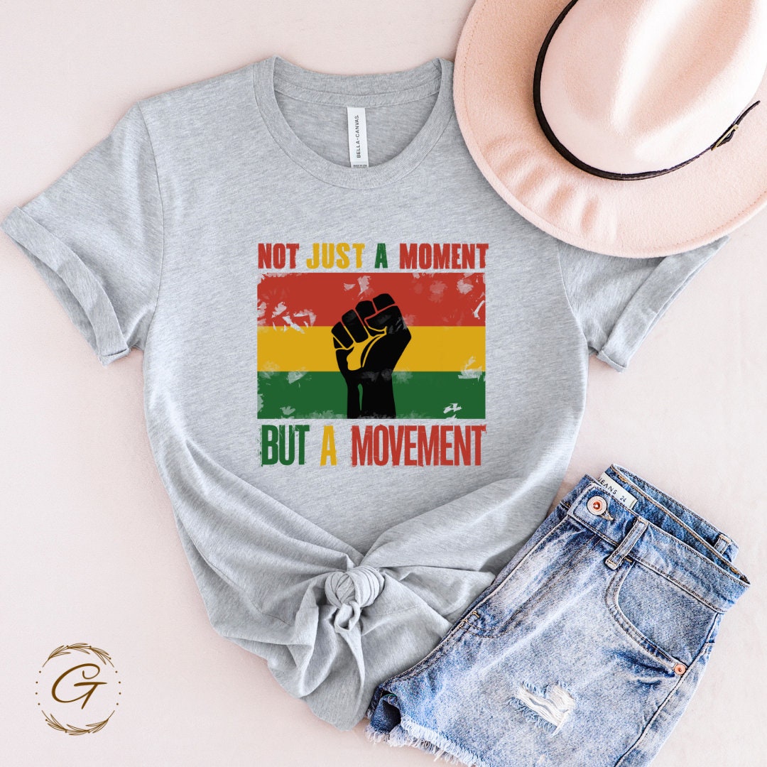 "Not Just a Moment but a Movement" T-Shirt – Empowerment Graphic Tee