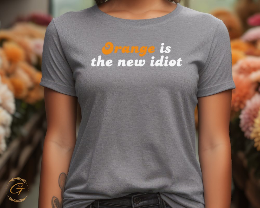 Orange is the new idiot graphic t-shirt product