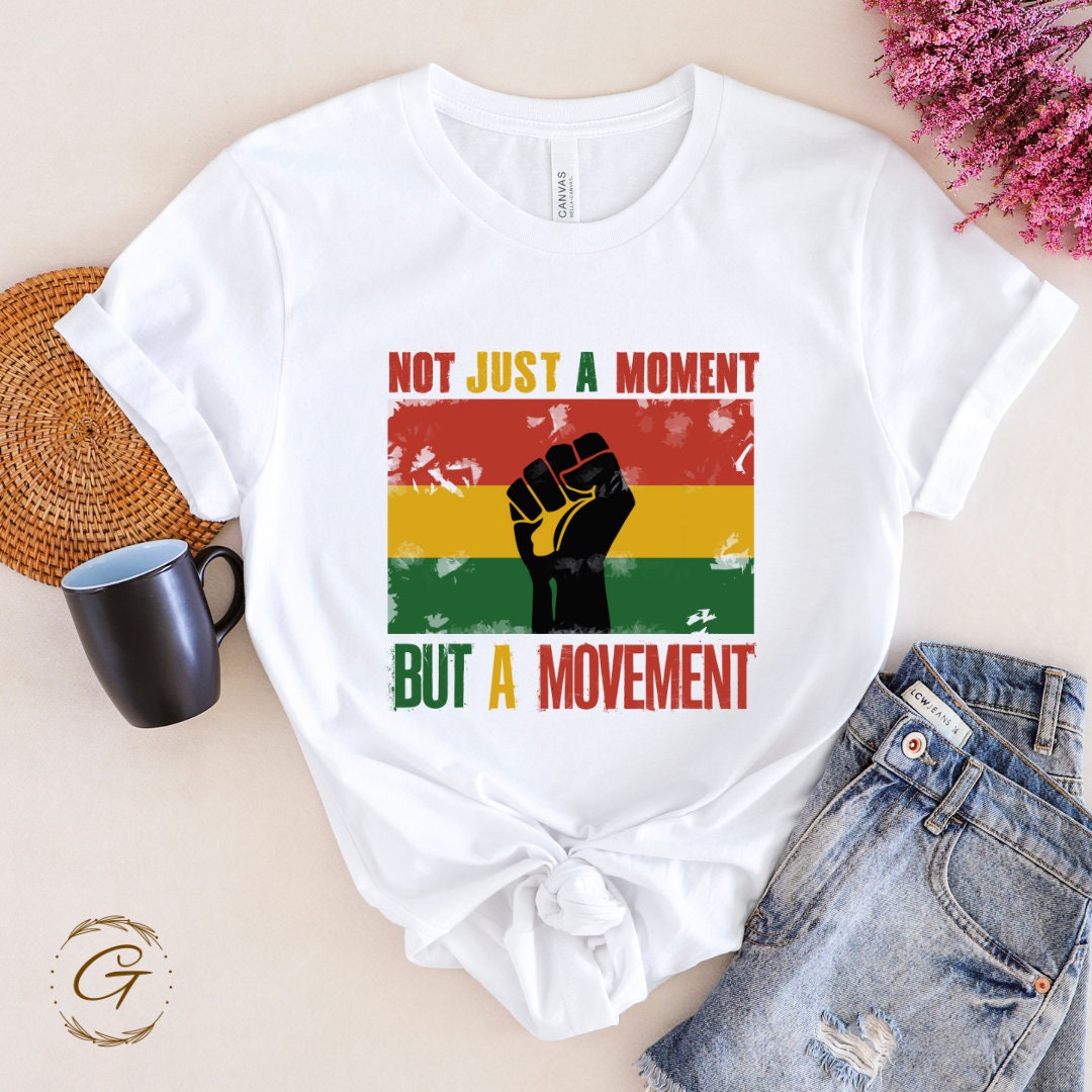 "Not Just a Moment but a Movement" T-Shirt – Empowerment Graphic Tee