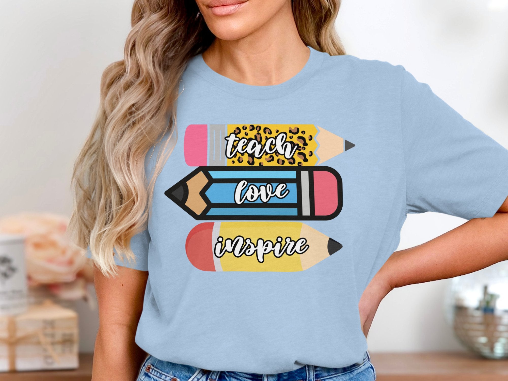 Teach Love Inspire Graphic T-Shirt product