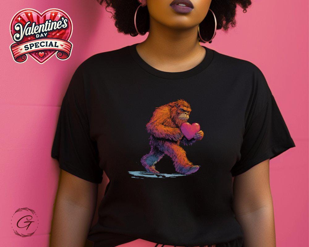 Bigfoot Sasquatch Holding Heart Graphic Tee