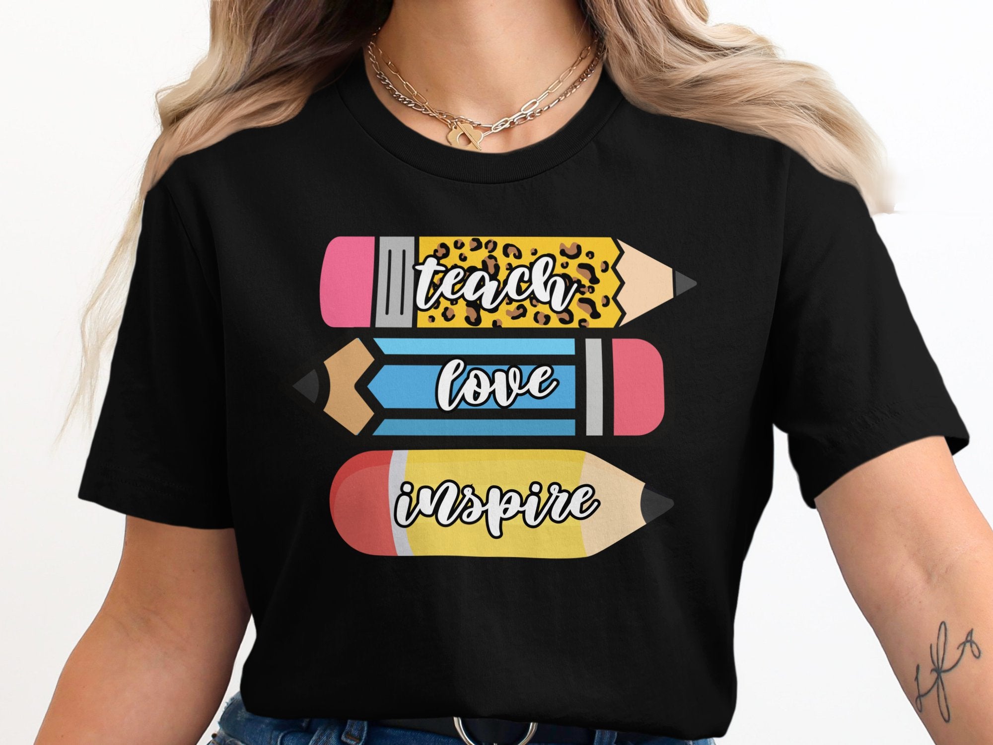 Teach Love Inspire Graphic T-shirt product type